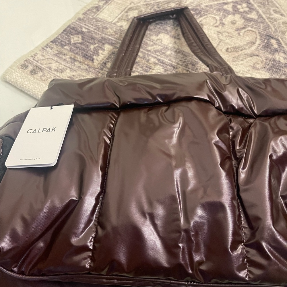Calpak Glossy glazed cherry color sold out